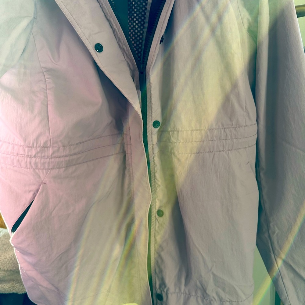 Brand new Canada Goose rain jacket with hood